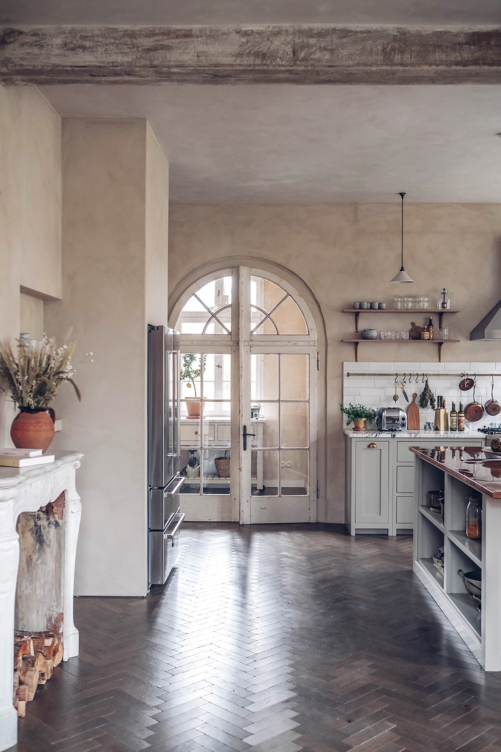 Décor Inspiration: An Elegant Kitchen in an Old Schoolhouse in the German Countryside with Marble Counters & Herringbone Floors