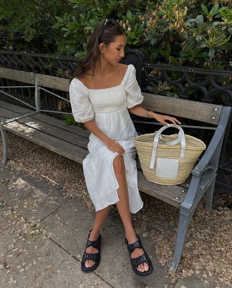 Felicia Akerstrom in a white dress